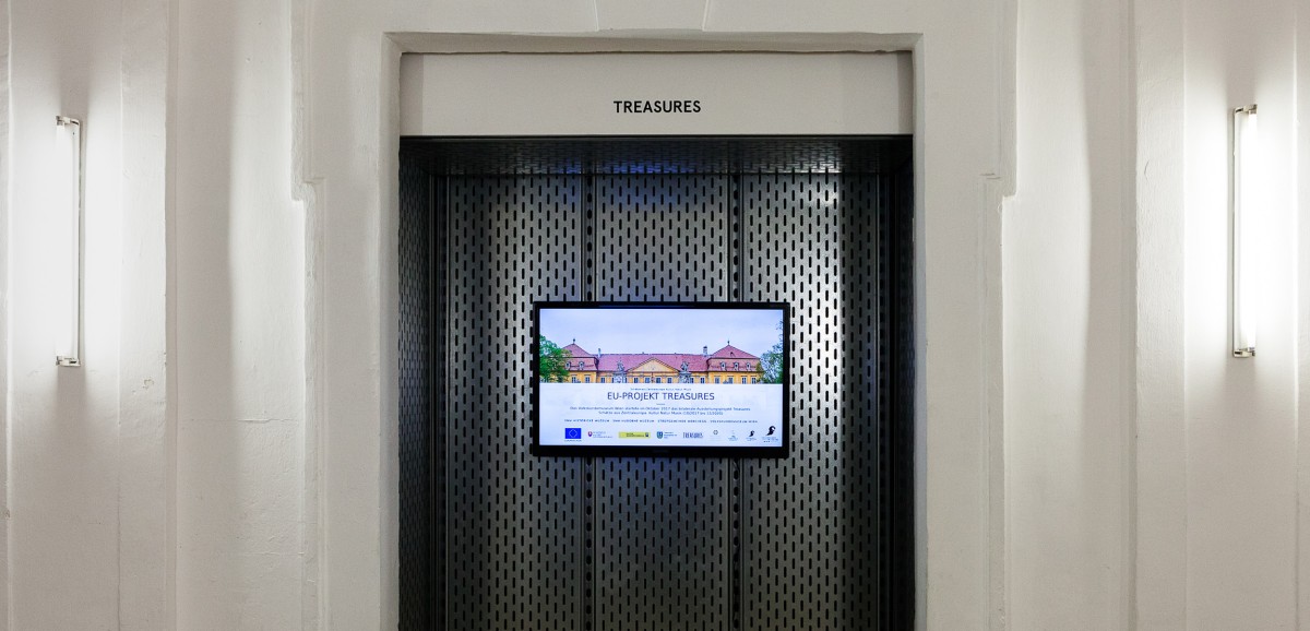 : Infoscreen zum EU-Projekt "Treasures" im Volkskundemuseum Wien. Foto: kollektiv fischka / Steffi Freynschlag © Volkskundemuseum Wien
